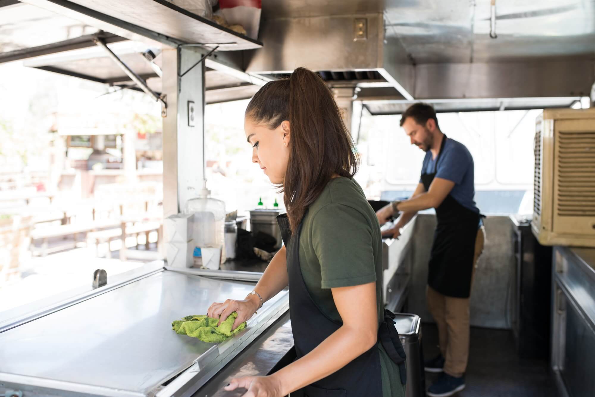woman-cleaning-a-food-truck.jpg